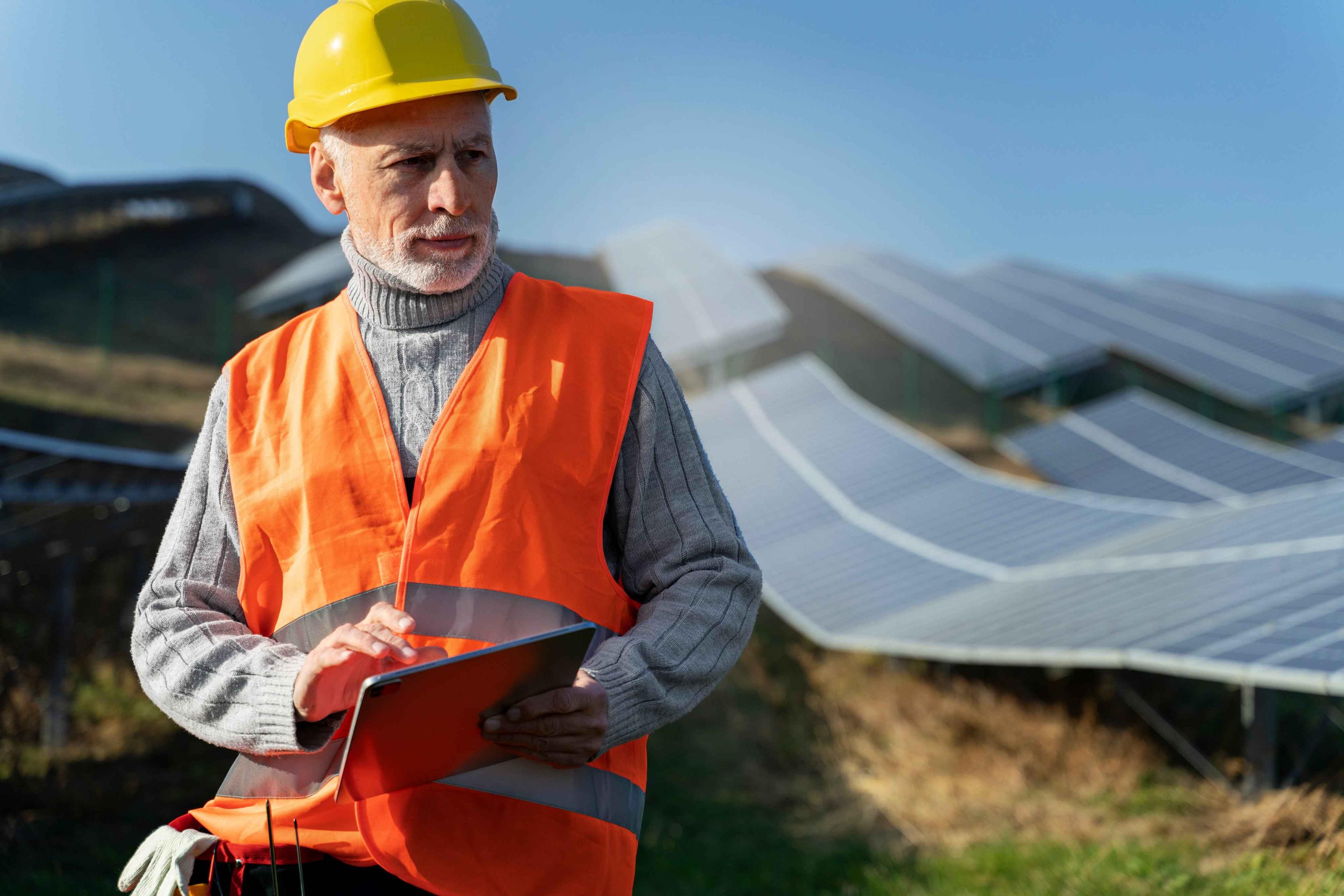 experienced solar panel installation professional in a field
