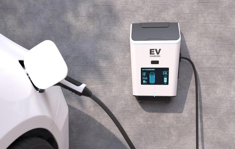 ev charger charging a white electric car